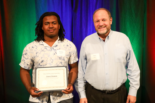 Scott Bradford with 2023 recipient Trinerty Thompson.