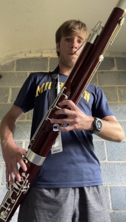 teen playing the bassoon