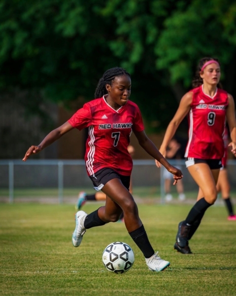 Denalia playing soccer