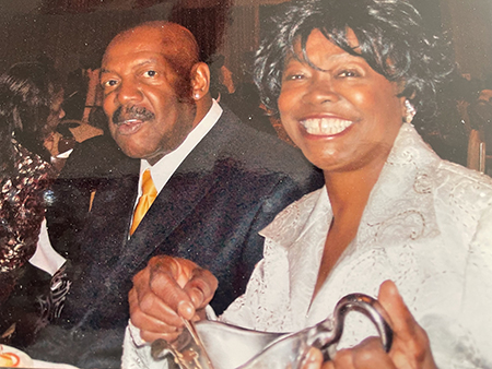 Photo of Ruth Ann and Louis Harvey smiling.