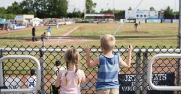 kids overlooking baseball field