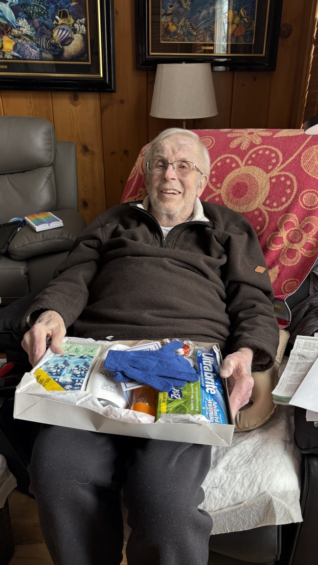 photo of a man sitting in his recliner