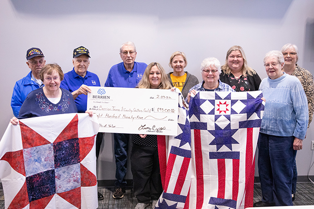 Group photo of a check presentation