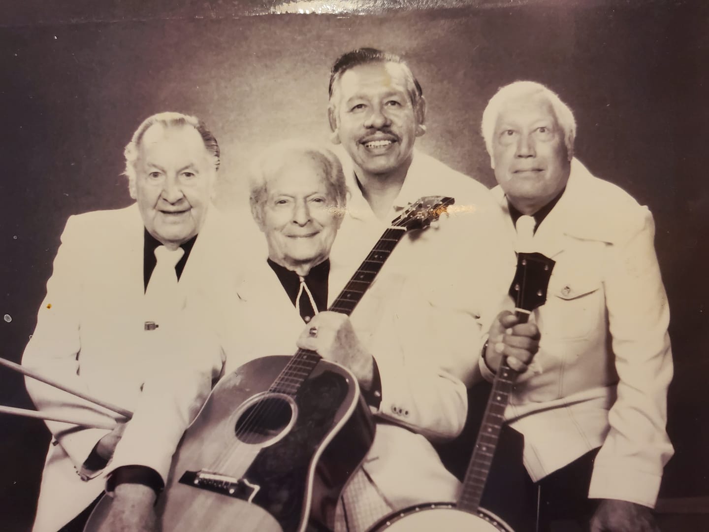 A vintage group photo of a band.