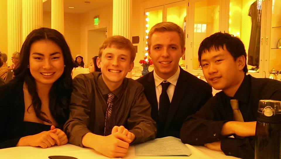 Group of friends sitting around a table.